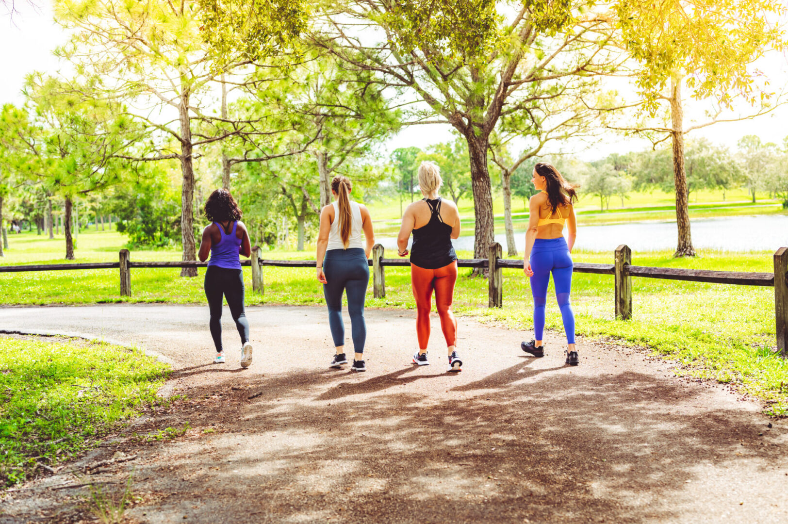 Group of athletic women walking outdoors